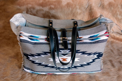 Shelbie Saddle Blanket Weekender Bag with Western-inspired patterns, ideal for cowgirls on the go.