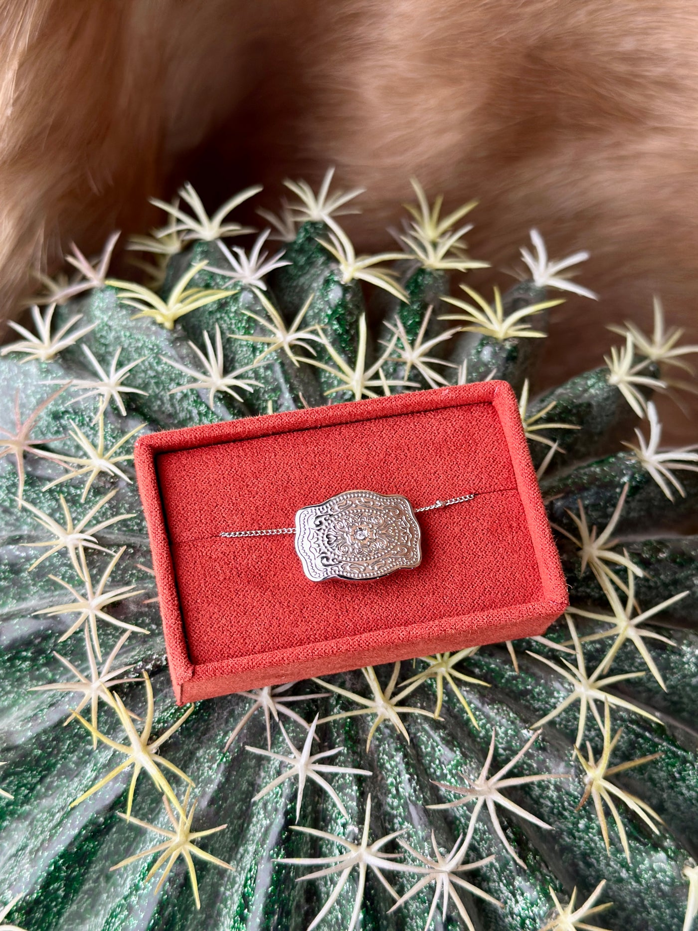 Elegant cowgirl necklace with mini silver buckle charm – perfect for layering