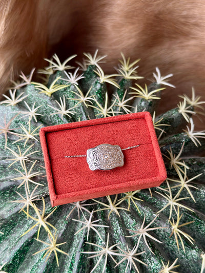Elegant cowgirl necklace with mini silver buckle charm – perfect for layering