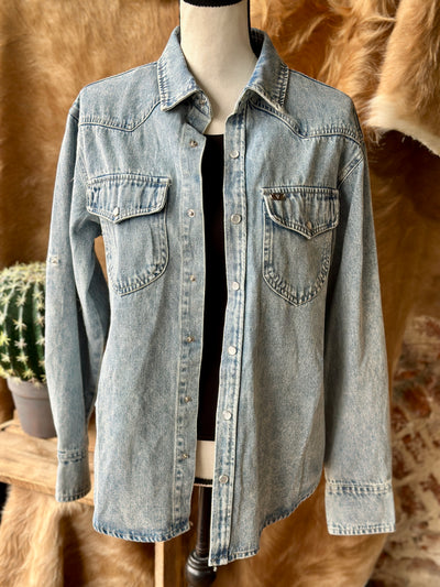 Detail of Statler Mineral Wash Denim Shacket – Functional Chest Pockets and Pearl Snap Closures