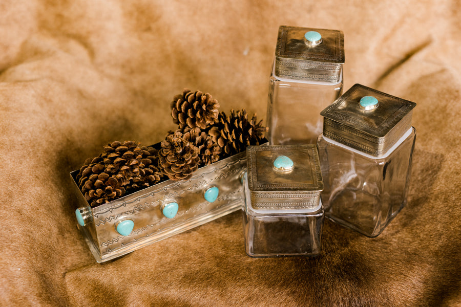 Handcrafted silver planter adorned with genuine turquoise nuggets.