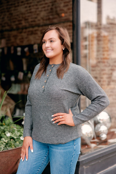 Model wearing the Take Me To Church buttoned sweater to Sunday service or weekday outings.