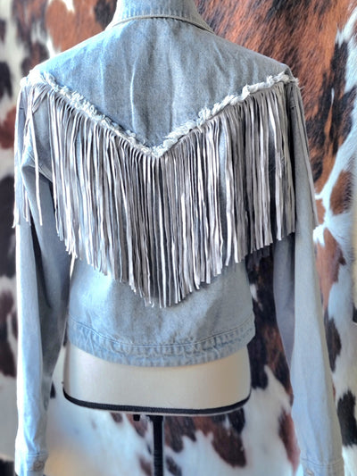 Back view of Tessa Fringe Denim Jacket featuring statement fringe design.