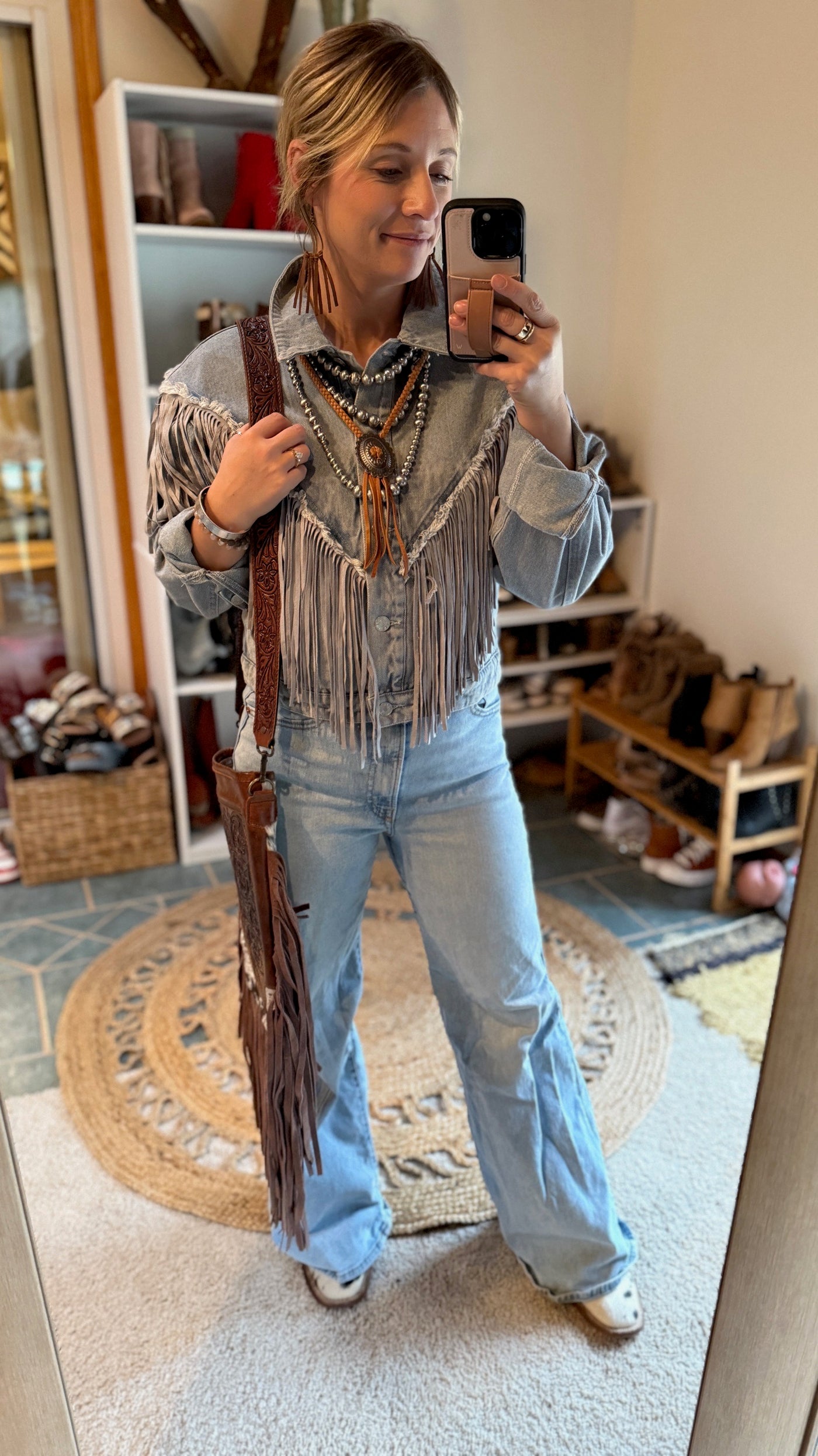 Feel the power of fringe and the Western vibes of denim in the Tessa Fringe Denim Jacket.