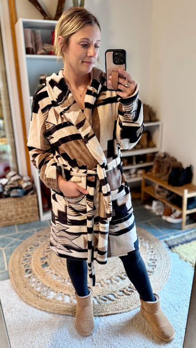 The Farm Mama Robe in a timeless Neutral Aztec print modeled by Broker Leather employee, Brooke.