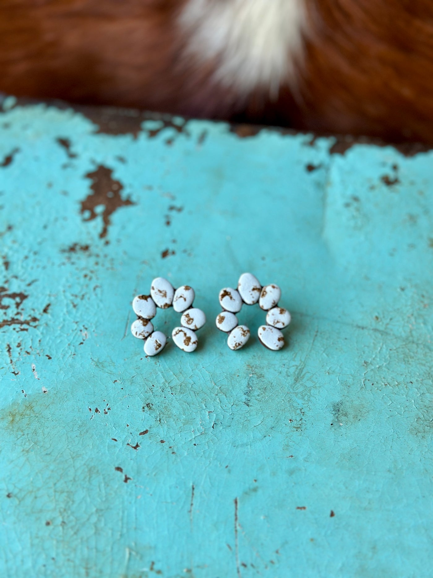 Front view of Torrington Clay Cluster Earring [White], highlighting its textured polymer clay resembling turquoise stones.