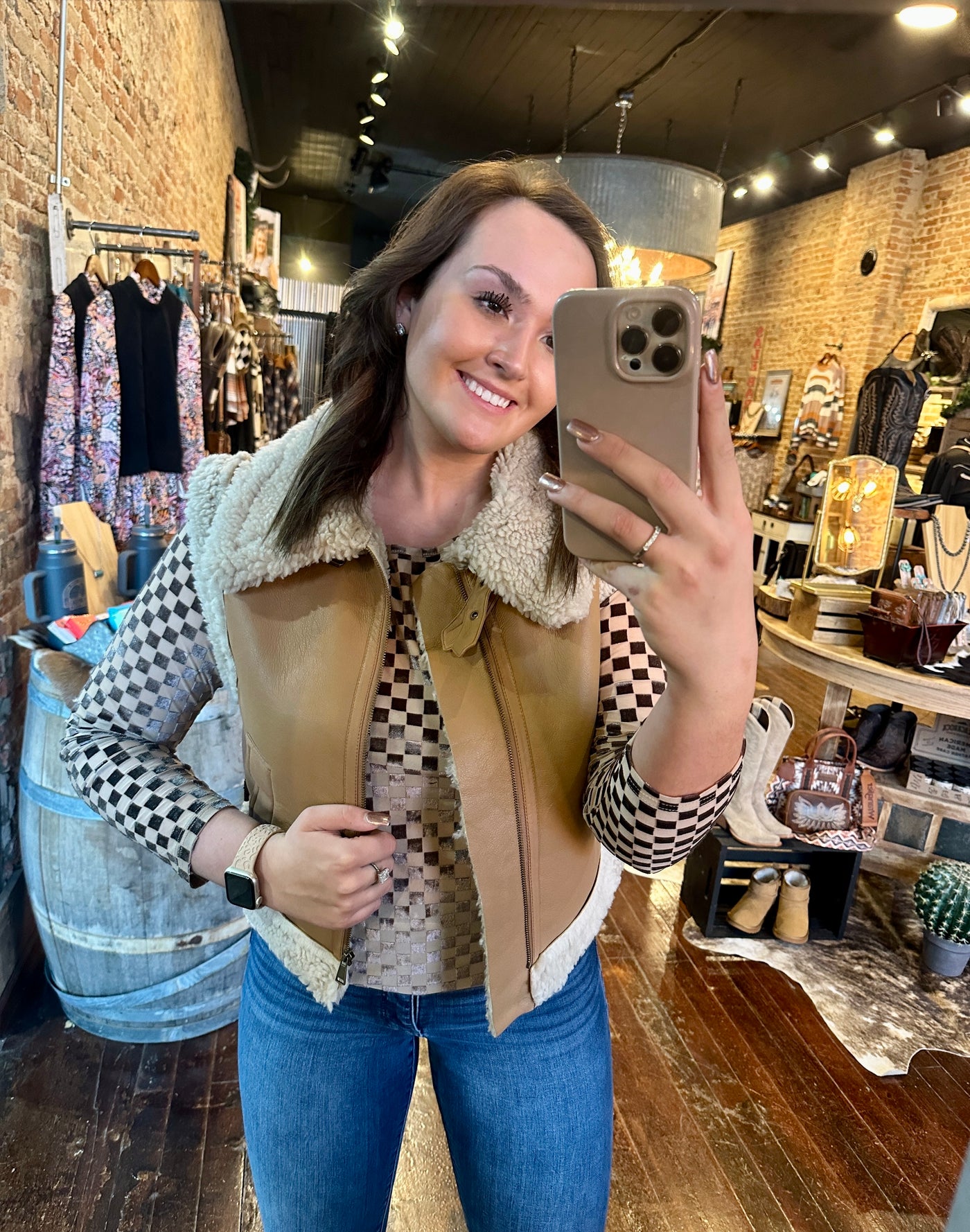 A Broker Leather Employee modeling the new Wallen Faux Leather Shearling Vest.