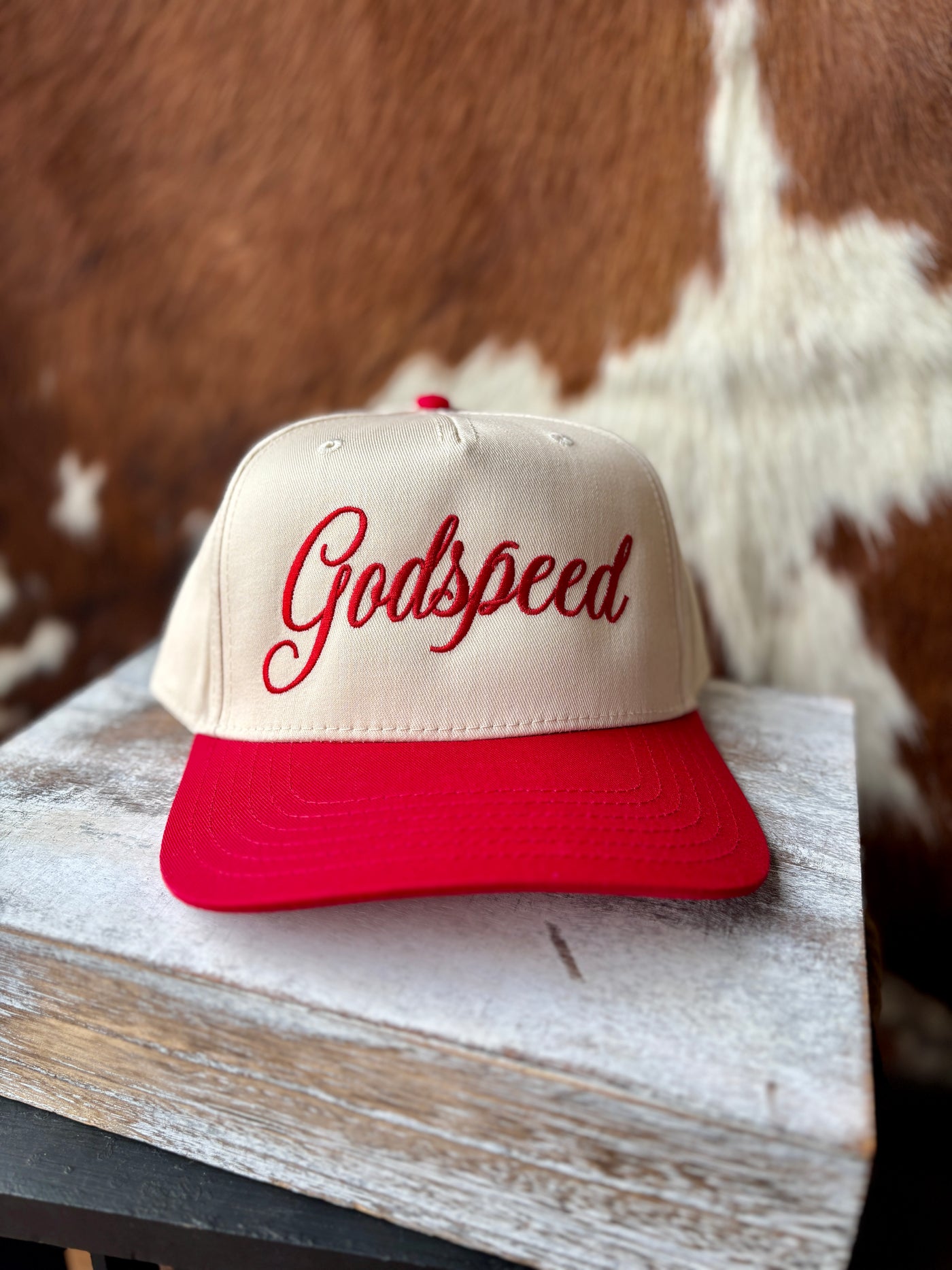 Flat lay of the Zach Godspeed Cap, emphasizing its seamless front panel and durable polyester-cotton blend.