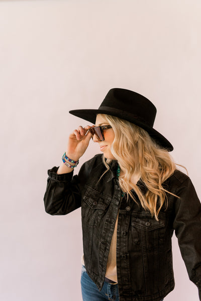 Kerosene Sunglasses featuring tortoise shell design and UV400 polarized lenses.