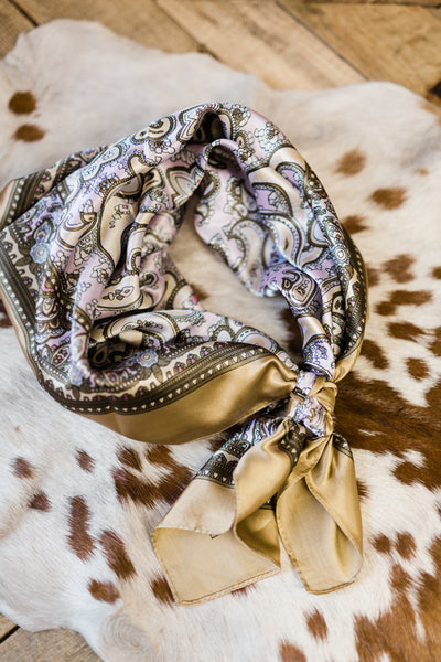 Flatlay photo showing the Beatrice Lavender & Tan Paisley Wild Rag.