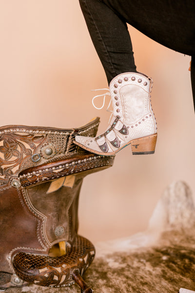 White leather Lane Showdown Boots with a 2.25-inch heel and 7.5-inch shaft height.