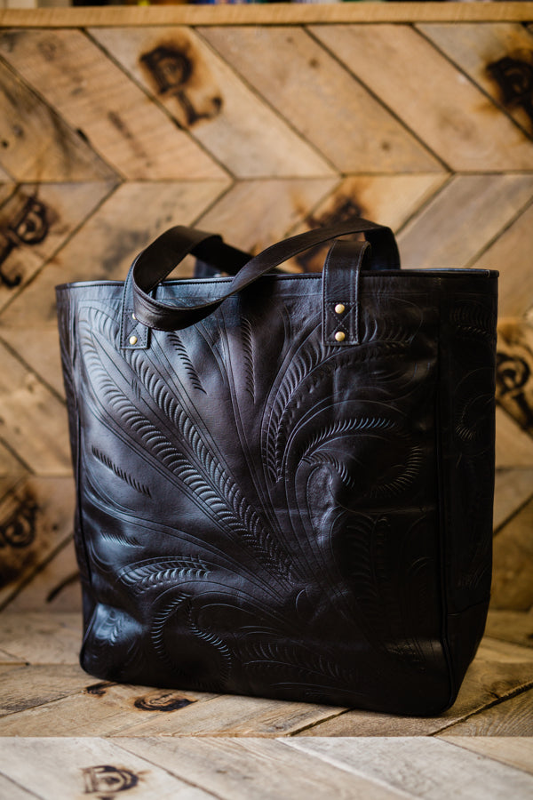Broker Leather's Hand Tooled Leather Tote Bag in Black, perfect for traveling, a new mom, or a corporate cowgirl.