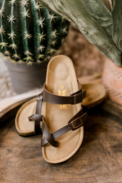 Everyday wear dark brown toe-loop sandals styled for comfort and flexibility
